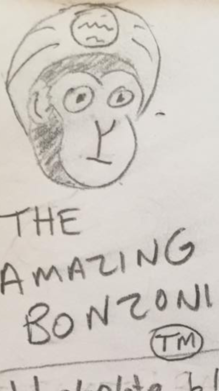 THE AMAZING BONZONI,™ future-predicting chimp, is the Hot Plate mascot.