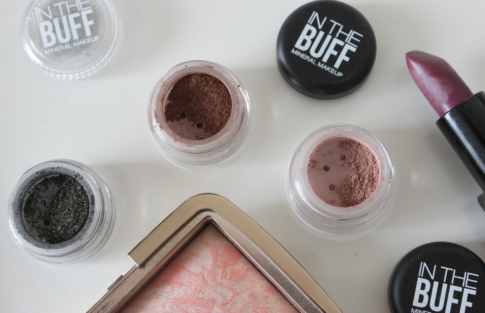 A picture of In The Buff mineral eyeshadows in Dark Skies, Baked Earth and Earth