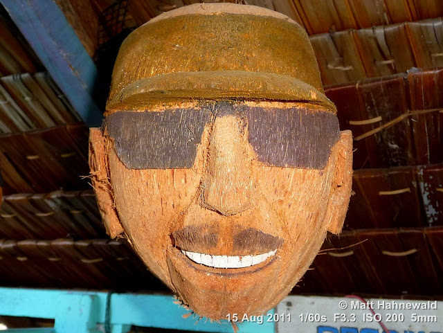 coconut art, hand-carved coconut head, Indonesia, Central Sulawesi, Tanjung Karang, Facing the World, © Matt Hahnewald
