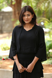 Actress Hebah Patel Stills in Black Mini Dress at Angel Movie Teaser Launch  0004