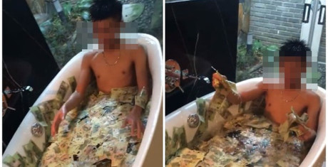 Phản cảm hình ảnh tắm cùng tiền của 'thiếu gia nhà giàu' - Ảnh 1 Phan cam hinh anh tam cung tien cua 'thieu gia nha giau' - Anh 1