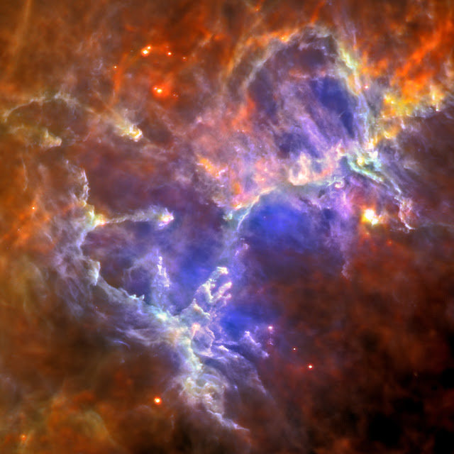This Herschel image of the Eagle nebula shows the self-emission of the intensely cold nebula’s gas and dust as never seen before. Each color shows a different temperature of dust, from around 10 degrees above absolute zero (10 Kelvin or minus 442 degrees Fahrenheit) for the red, up to around 40 Kelvin, or minus 388 degrees Fahrenheit, for the blue.   Herschel reveals the nebula's intricate tendril nature, with vast cavities forming an almost cave-like surrounding to the famous pillars, which appear almost ghostly in this view. The gas and dust provide the material for the star formation that is still under way inside this enigmatic nebula.   Far-infrared light has been color-coded to 70 microns for blue and 160 microns for green using the Photodetector Array Camera, and 250 microns for red using the Spectral and Photometric Imaging Receiver.   Herschel is a European Space Agency cornerstone mission, with science instruments provided by consortia of European institutes and with important participation by NASA. NASA's Herschel Project Office is based at NASA's Jet Propulsion Laboratory, Pasadena, Calif. JPL contributed mission-enabling technology for two of Herschel's three science instruments. The NASA Herschel Science Center, part of the Infrared Processing and Analysis Center at the California Institute of Technology in Pasadena, supports the United States astronomical community. Caltech manages JPL for NASA.   Image Credit: ESA/Herschel/PACS/SPIRE/Hill, Motte, HOBYS Key Programme Consortium Explanation from: http://www.nasa.gov/mission_pages/herschel/multimedia/pia15260.html