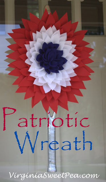 Patriotic Wreath - Use an old or broken tennis racket to make a tennis racket wreath.