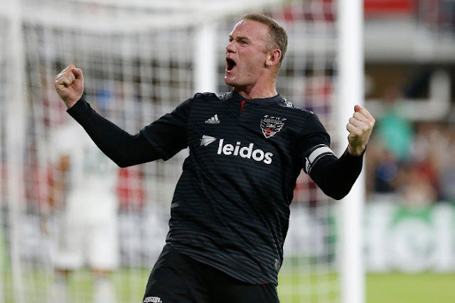 Wayne Rooney celebrates scoring for DC United against Portland in the MLS
