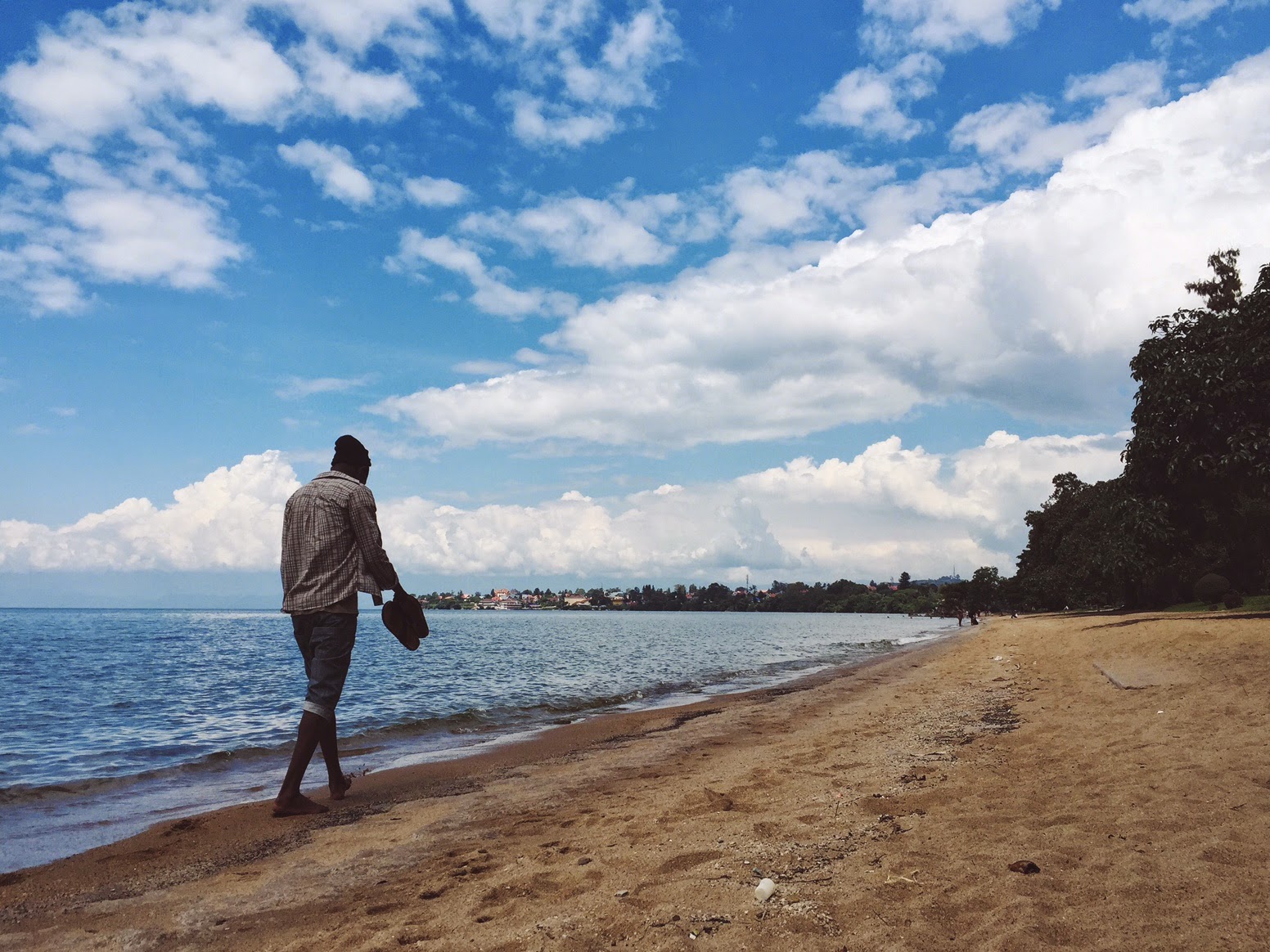 lake kivu rwanda gisenyi beach man male