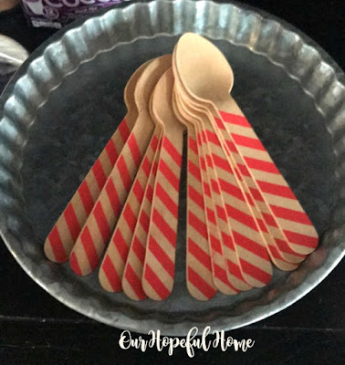 red white striped candy cane wooden spoons