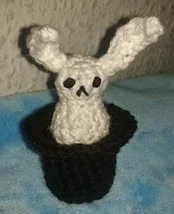 http://www.ravelry.com/patterns/library/amigurumi-hat-trick---tiny-rabbit-and-top-hat
