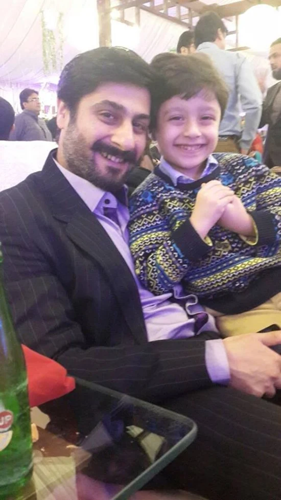 Kamraan Jeelani with his son