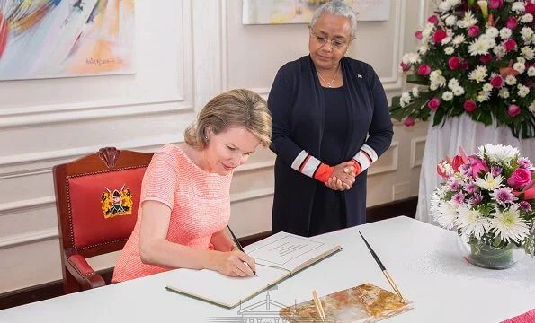 Queen Mathilde Dries Van Noten jacket and trousers, Natan dress, Crown Princess Elizabeth in Maje blouse and white trousers