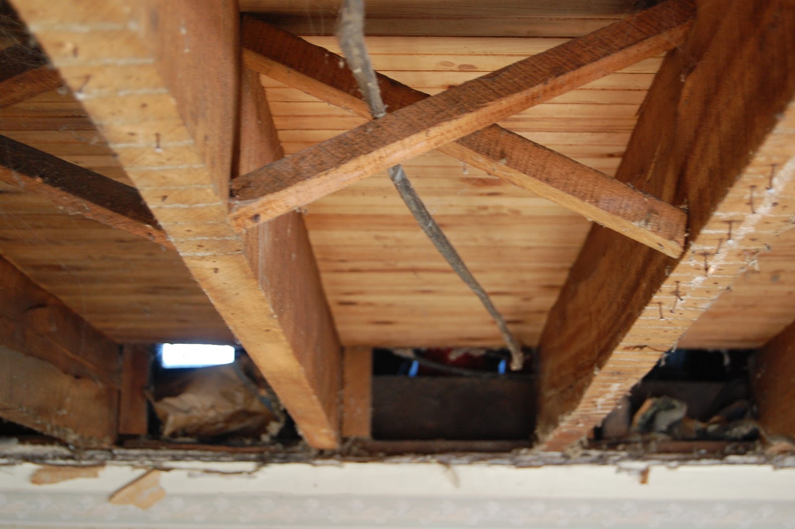 THE.BURK.HAUS: living room exposed floor joists mayhem