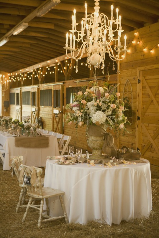 Mix christmas lights chandeliers and candles with wood hay 