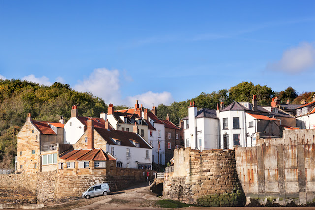 View of Robin Hood's Bay in the morning sunshine by Martyn Ferry Photography
