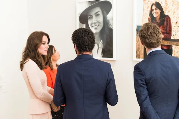 Kate Middleton visits the 'Vogue 100' exhibition. Kate Middleton wore her Alexander McQueen Wool and Cashmere Blend Dress