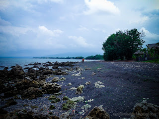 Rural Fishing Beach Panorama With Coral Reefs At Umeanyar Village, North Bali, Indonesia