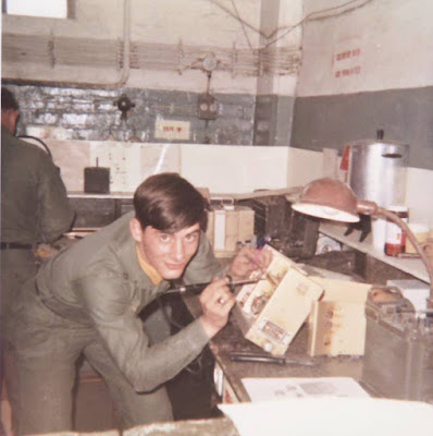 Ken Padgett fixing a radio