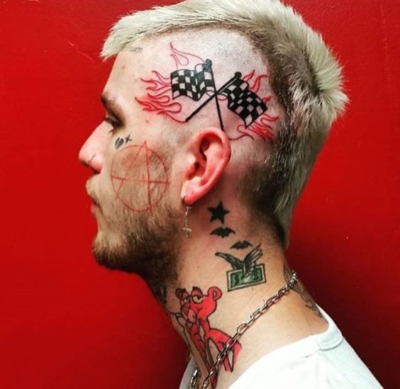 Lil peep flag tattoo on head