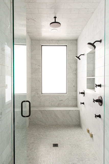 Luxury marble tile shower in modern mountain house