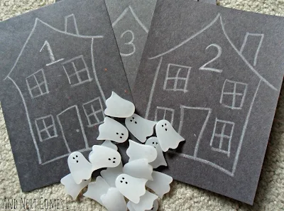 Materials in the ghost counting Halloween busy bag for kids from And Next Comes L