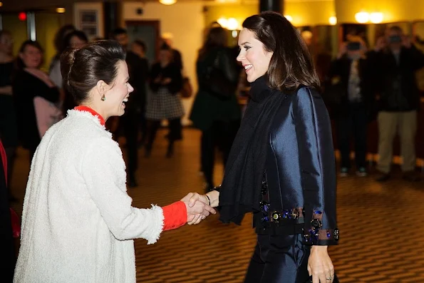 Crown Princess was Tuesday, March 8 present at KVINFO marking International Women's Day at the venue Vega in Copenhagen. Pictured greet Crown Princess on his arrival at KVINFO chairwoman, Nina Groes.