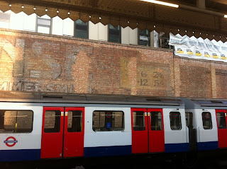 Ghost sign for the Palais De Danse, Hammersmith tube station, London