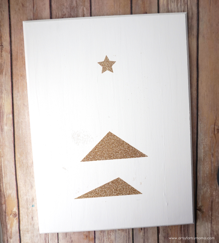 Make this easy DIY Modern Christmas Tree Sign to add some holiday sparkle into your home!