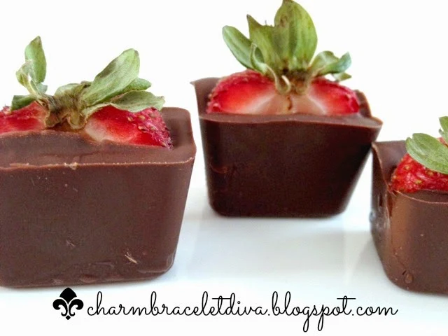 halved strawberries homemade chocolate cubes
