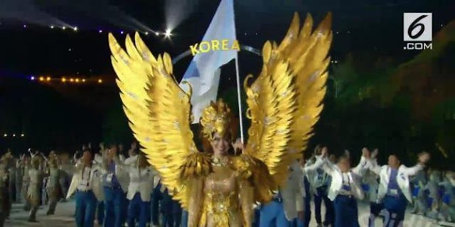 Saat kontingen Korut dan Korsel satu bendera dalam pembukaan Asian Games