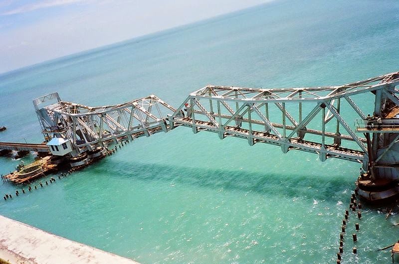 The Pamban Bridge is a cantilever bridge on the Palk Strait which connects the town of Rameswaram on Pamban Island to mainland India. 