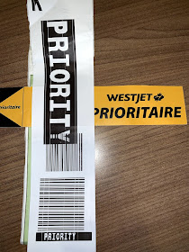 westjet add baggage