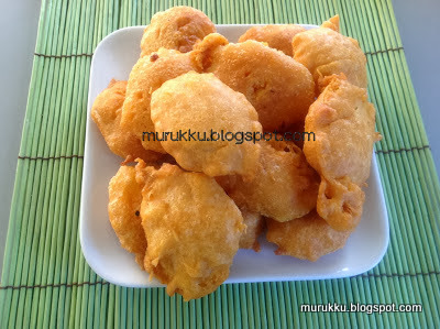 potato slices are dipped in gram flour batter and deep fried