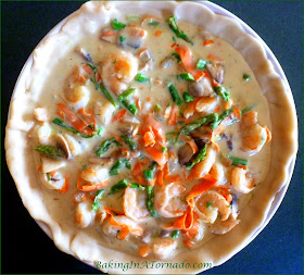 Shrimp Pot Pie, shrimp and vegetabless in a light sauce, cooked in a flaky crust | Recipe developed by www.BakingInATornado.com | #recipe #dinner #shrimp
