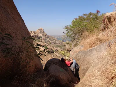 The loapers resting amidst boulders in the middle of nature