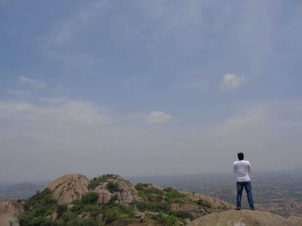The team, The Loapers, posing before the Savandurga trek at the base of the hill.