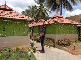 Three friends socializing at the dhaba after the trip.