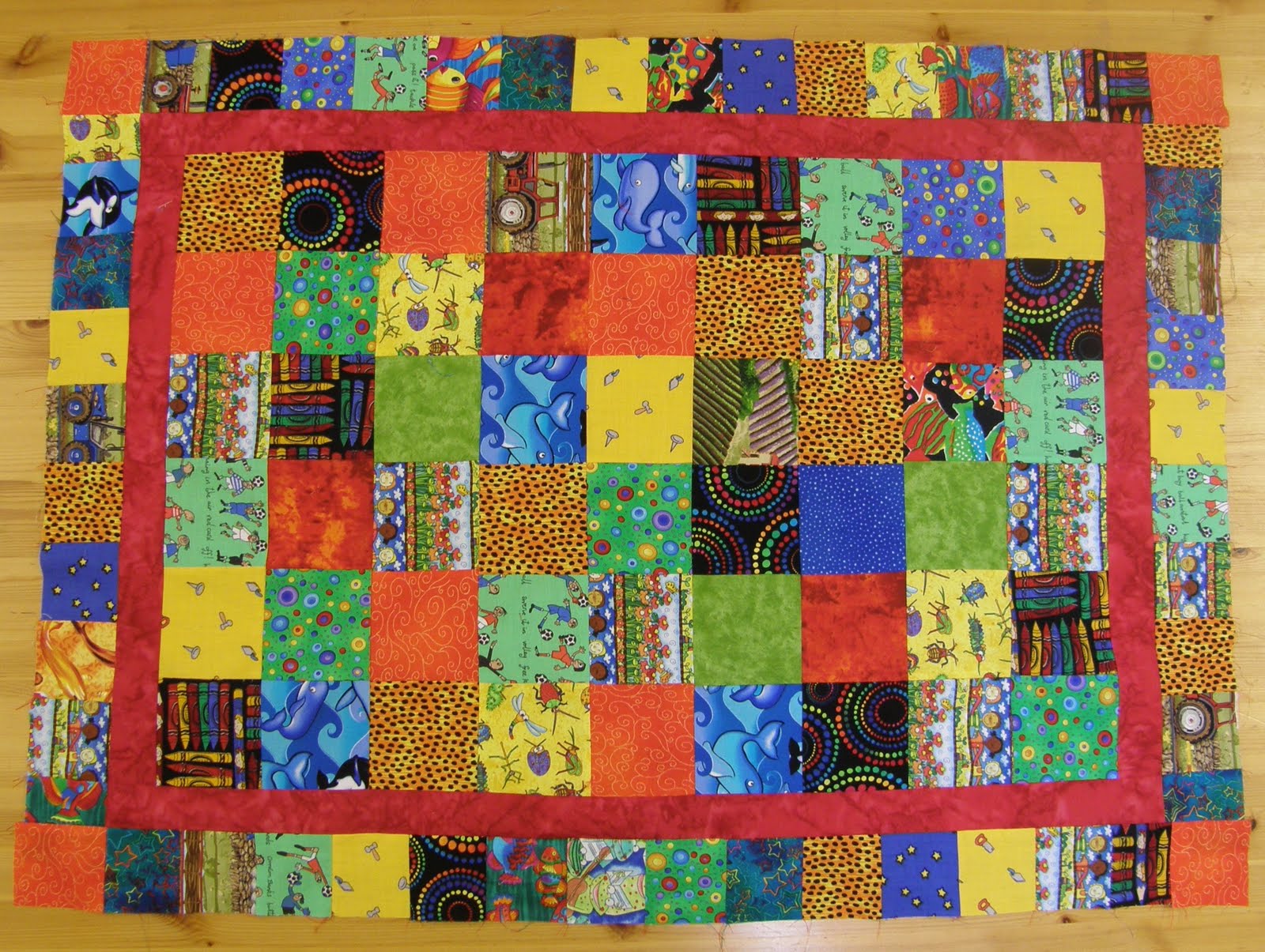 Quilters Cottage Norfolk Animal Cot Quilt