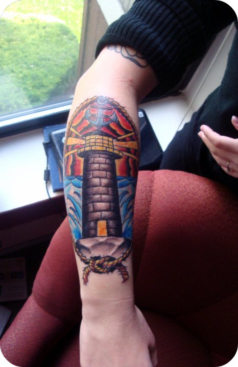 lighthouse tattoo. lighthouse tattoo.