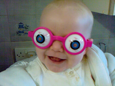Big Cousin as a Baby wearing crazy eye glasses
