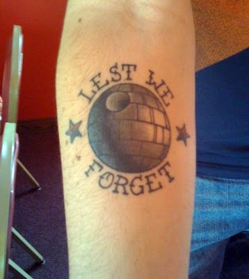  "super-geek" content trend going and post this nerd's Star Wars tattoo.