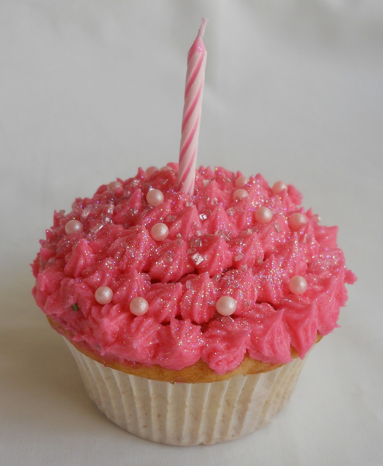 Sprinkles and Sparkles Pink flower sparkle cupcake