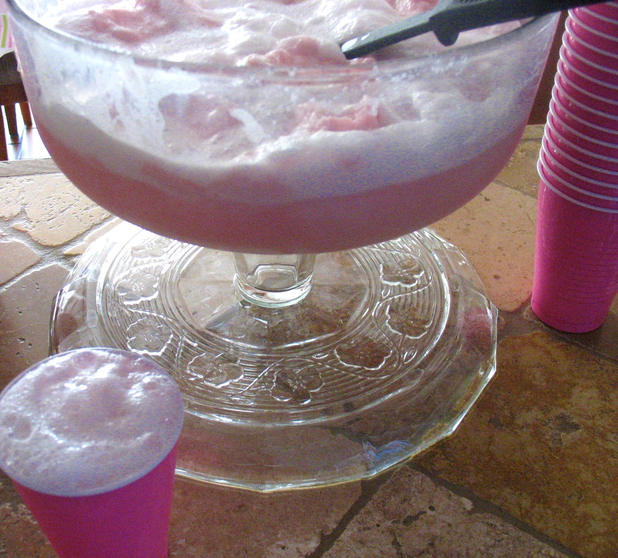 ... enjoyed the pink frothy yummy punch. It's just pink sherbert and 7-Up