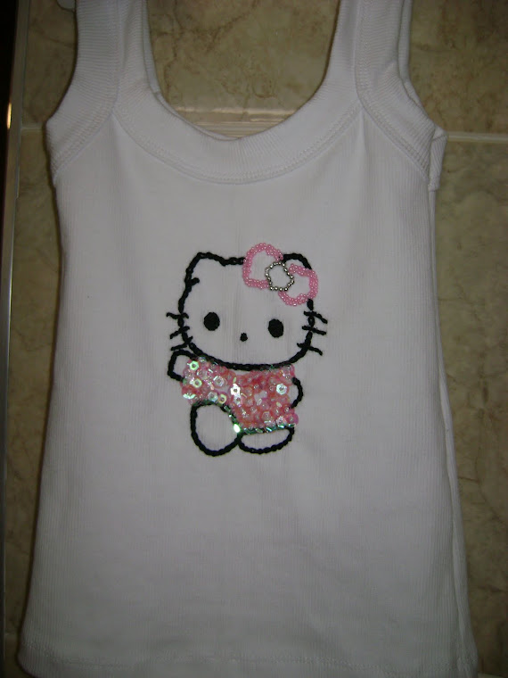Blusa Hello Kitty tam 5 e 6 anos