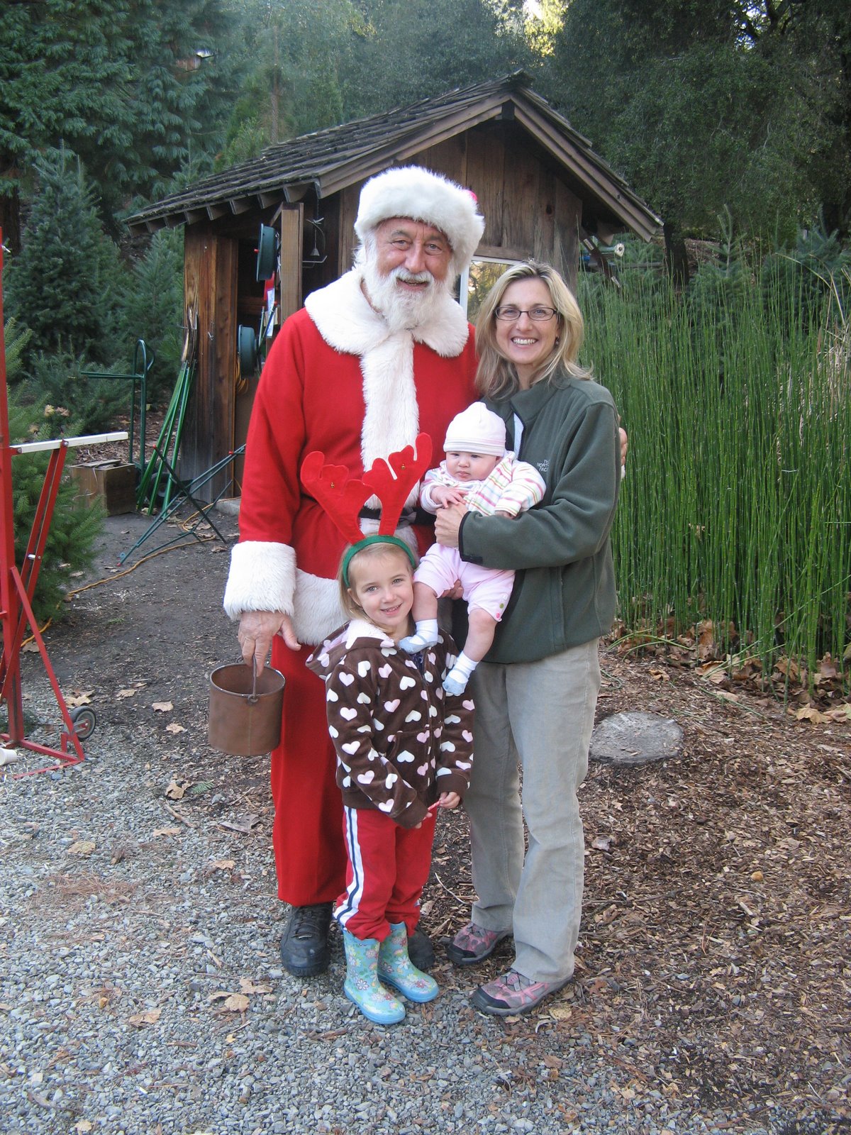 Ava B Meeting Santa at the tree farm