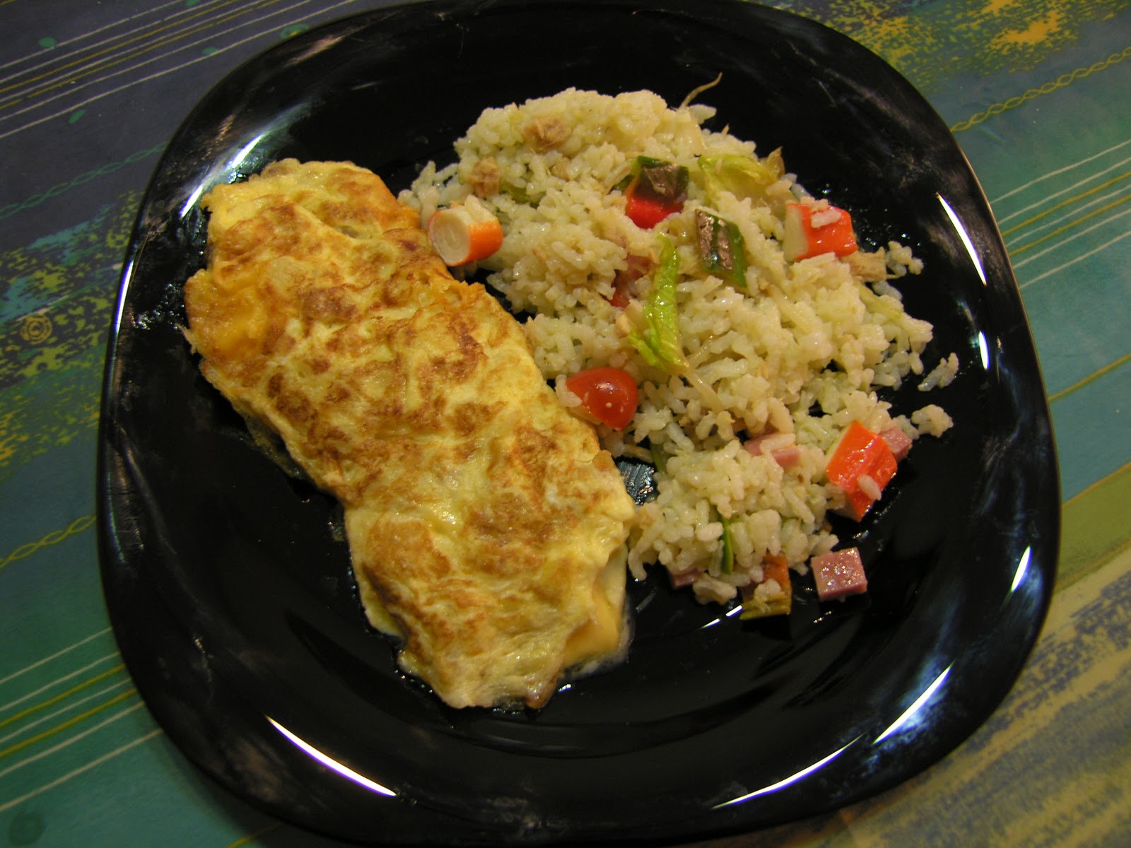 CAN JOAN I SARA TORTILLA CON QUESO Y CEBOLLA + GUARNICION DE ARROZ