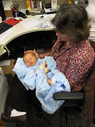 Amber Holley, Webb Wesconnett Branch Library, with Eight day old grandson, Donald