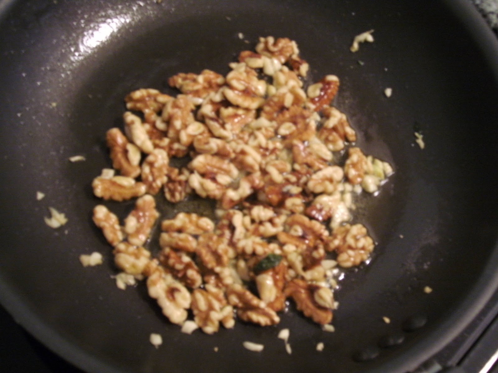 Sound Mind Nutrition sautéed greens tossed with toasted walnuts