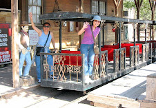 It's 95 degrees, we got nothin' to do but hang on a old rusted train