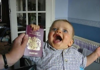 baby+holding+passport.jpg