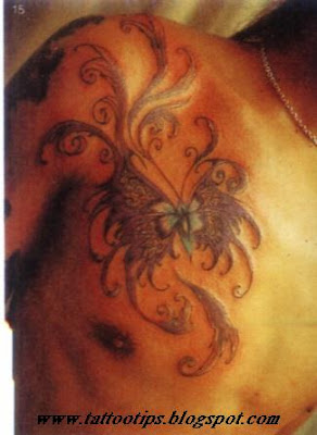 Butterfly tattoo on man chest