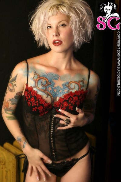 Chest tattoo woman no bra 5