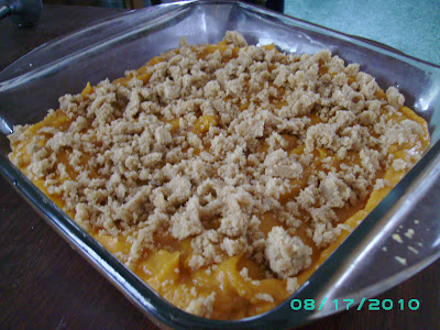 Image shows a pan of sweet potato casserole